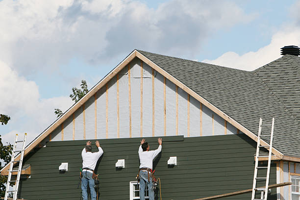 Professional Storm Damage Siding Repair technician working in Chester Springs, PA